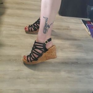 Cute strappy wedge sandals. 3" heel.